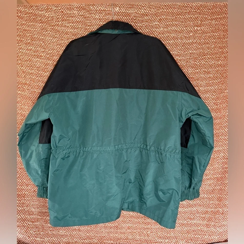 Vintage Teal and Black Caterpillar Windbreaker